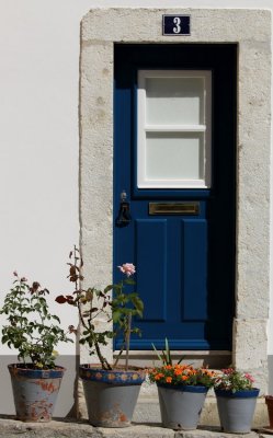 Blue door in Alfama district, Lisbon