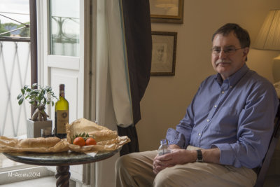 Chuck sitting down to lunch in our room.