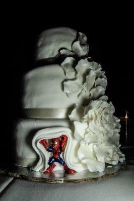 Spiderman hiding in wedding cake - surprise for couples son. Photo by Cecilia Dumas