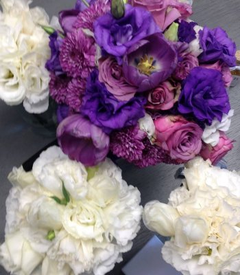 Purple Bridal bouquet & white bridesmaid Bouquets. Lisianthus, tulips, roses