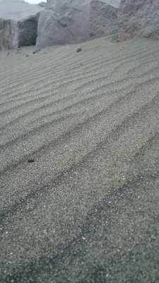 Waves Caught in Sand