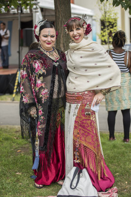 THESE YOUNG LADIES ARE WEARING THEIR TRADITIONAL DRESS