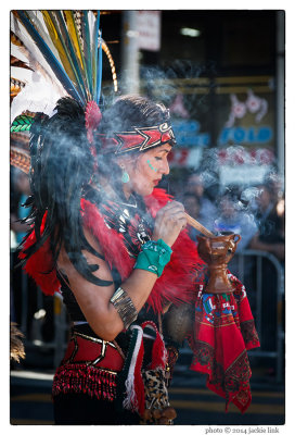 032-Carnaval-Azteca stirring incense.jpg