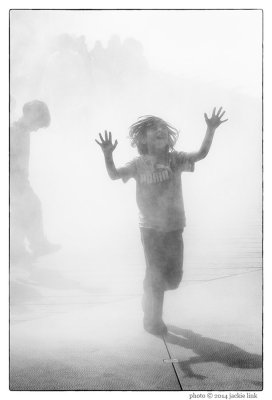 Boy running on Fog Bridge.jpg