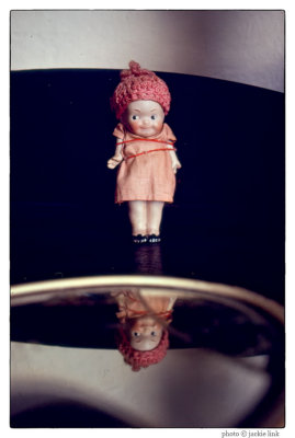 Kewpie doll on dresser.jpg