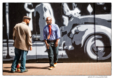 Two Men Talking on Market Street
