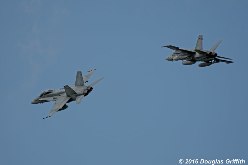Two CF-188 Hornets in a Separation (Spacing) Break for Landing: Runway 33, CYXU