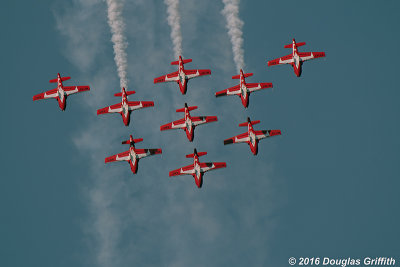 Sun Reflecting off the Nine Aircraft Formation: Canadair CT-114 Tutors of 431 Air Demonstration Sqdrn: The Snowbirds