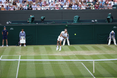 Federer serves
