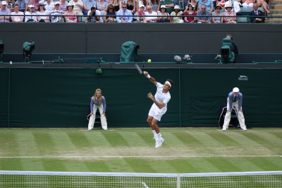Federer serves