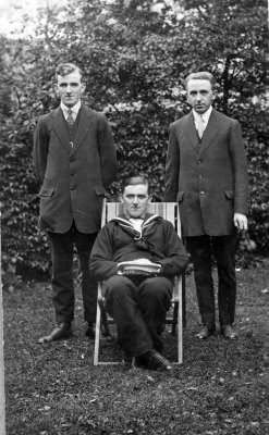 Ernest Shaw standlng on left,  Richard Shaw standing on right & Enos seated