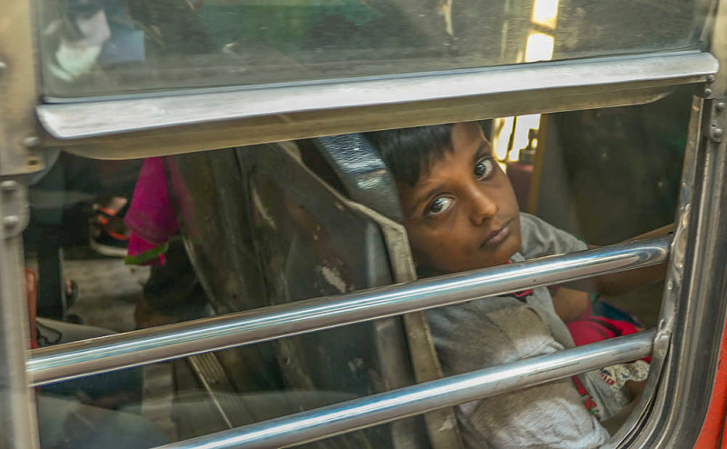 A face in the window, Bombay, India, 2016