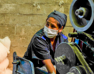 Machine operator, Sucre hat factory, Sucre, Bolivia, 2014