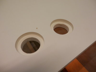 PVC board with holes cut for plumbing