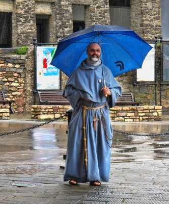 Classy monk in the rain...