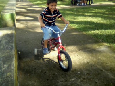 Jian on his bike and di slide 07.jpg