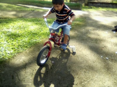 Jian on his bike and di slide 09.jpg