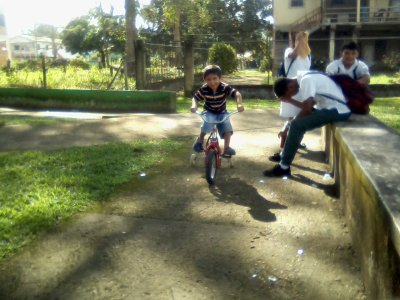 Jian on his bike and di slide 11.jpg