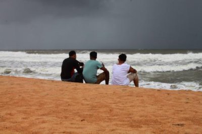 2014080973 Guys on Candolim Beach.JPG