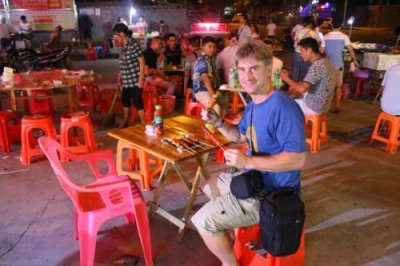 2015080879 Paul eating Zhangjiajie.jpg