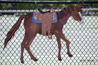 Pony on a Fence