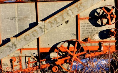 McCormick thresher in morning sunlight.  January 2015
