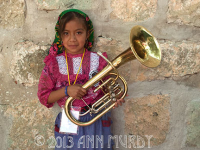 Little girl with her horn