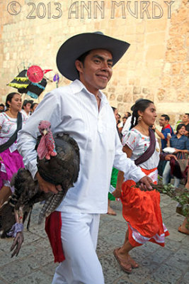 Carrying turkey in procession