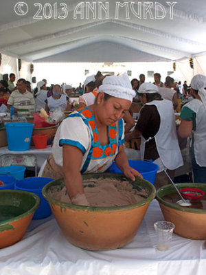 Lady mixing up tejate