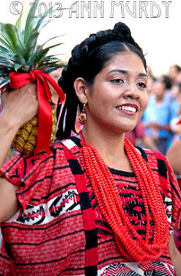 Flor de Pia dancer in red huipil
