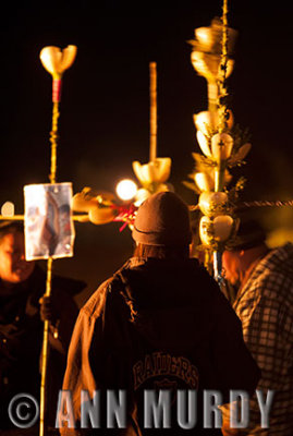 Pilgrims holding Quiotes