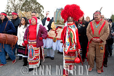 Benita and Crystal carrying Our Lady