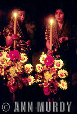 Ladies holding their candles