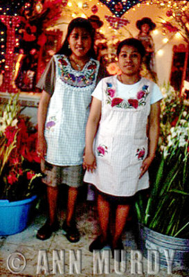 Girls in Front of Posada Altar