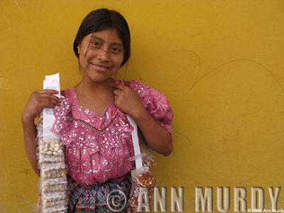 Girl selling peanuts