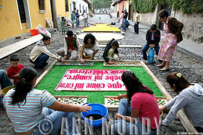 Family working on carpet