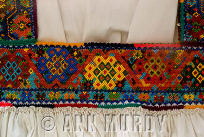 Detail of beaded blouse from San Pablito, Puebla