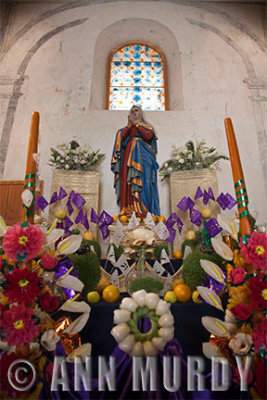 Madre Dolorosa altar with candles
