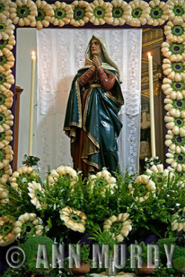 Madre Dolorosa surrounded by hearts of palm