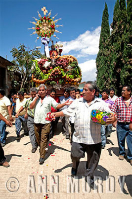 Carrying processional float to church