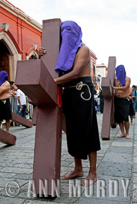 Penitentes with crosses