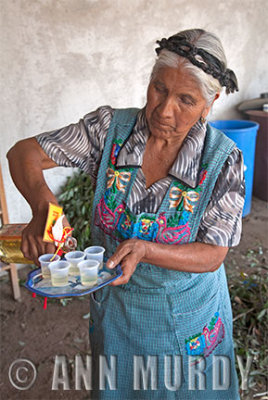 Natala pouring mezcal, Section 4