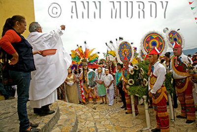 Padre blessing the dancers