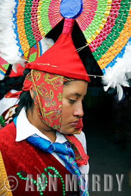 Huahua dancer inside capilla