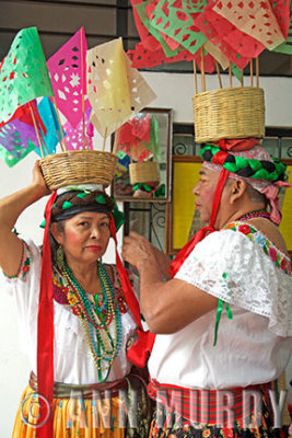 Preparing canasta for procession