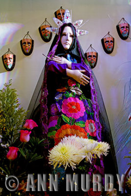 Virgin with Parachico Masks