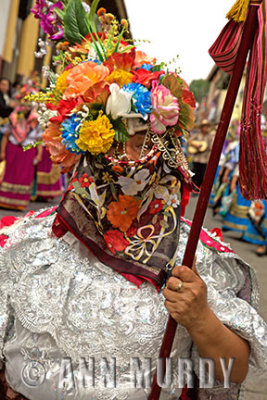 Danza de la Mora lady carrying banner