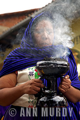 Girl from Tzintzuntzan burning copal