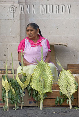 Lady selling palm weavings