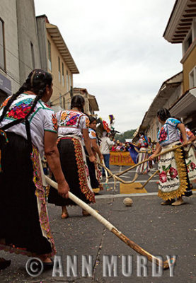 Women playing ball in parade